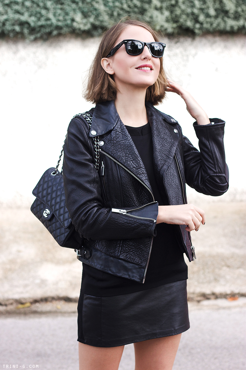 Body Language-Bag worn over one shoulder and held close to the body